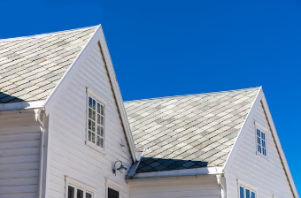 image of a house with a shingle roof in Northwest Arkansas